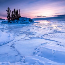 Icy Sunrise over Frozen Lake Superior